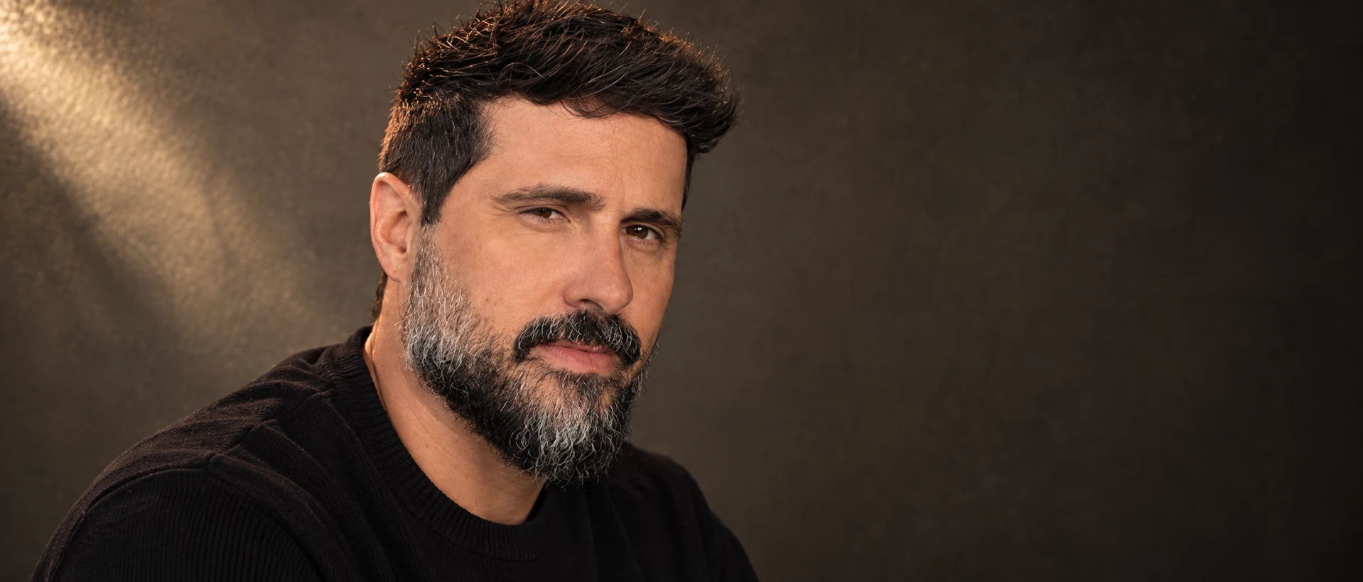 Retrato de Tchelo Castro